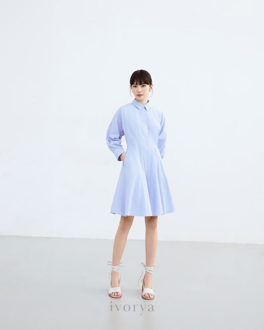 Đầm sơ mi màu xanh dương nhạt, tay dài xếp ly cách điệu - YD9836
